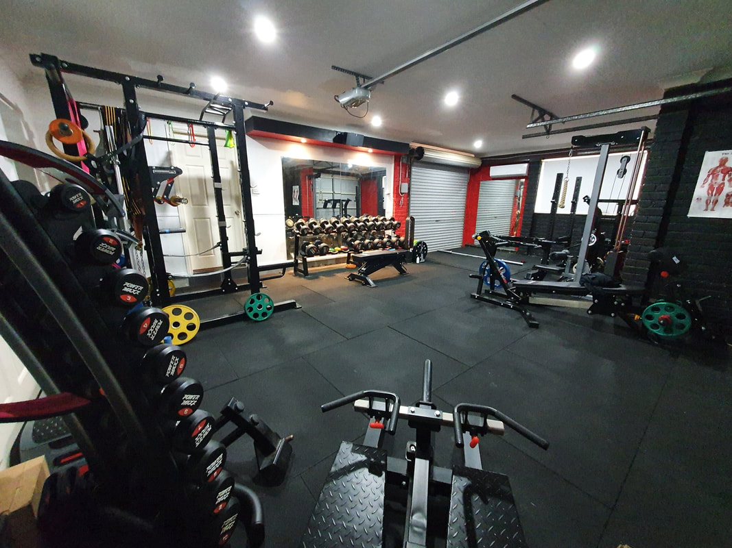 Hybrid PT Studio Dumbbells and Machines